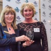 Cherry Birch (YV Board) presents Sue Bowes with her award at the 2014 Yachting Vic Awards night