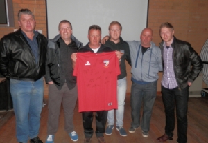 Members of the Team of the Period with the signed shirt from the Celebration Game